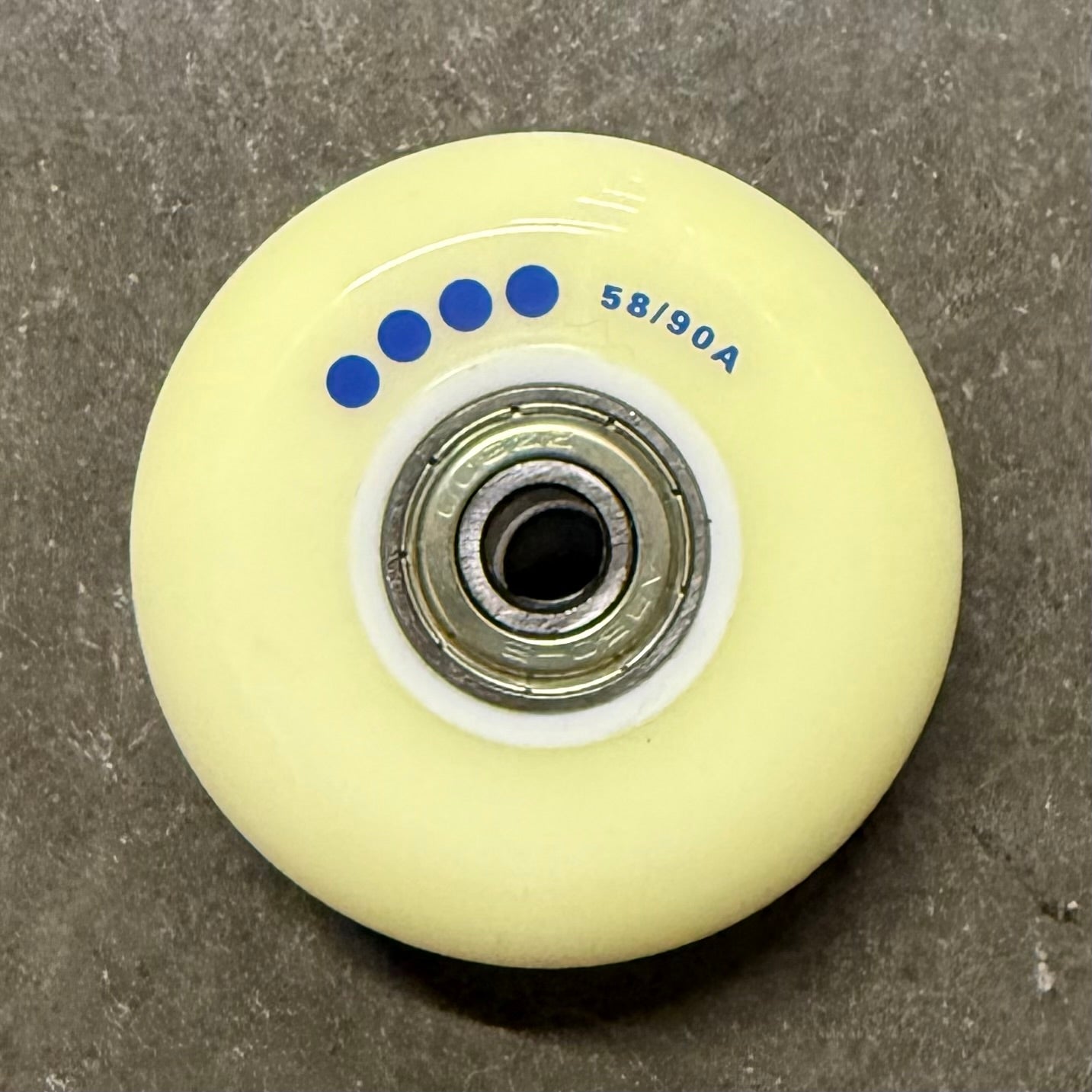 Them Stock Team Wheel 58mm 90a with ABEC 5 Bearings (4 pack) - Yellowed Urethane - Deal Pricing!